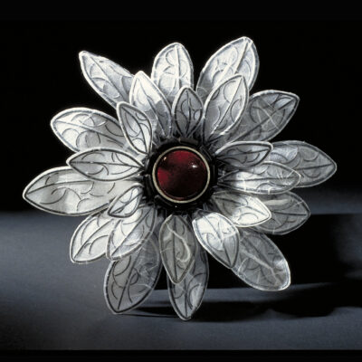 White Flower with Red Porcelain Center by Carol Windsor