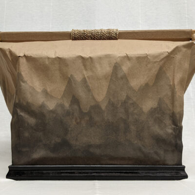 A Paper Bag Retaining the Memory of Fire Preserved by Clayton Moraga