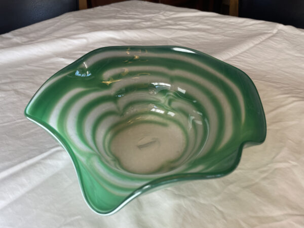 Hand blown glass bowl with green wrap by Michael Stromberg